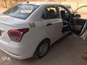 11 months old hyundai xcent taxi car in new condition for