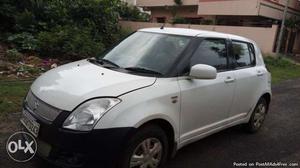 Swift white  with insurance and good condition