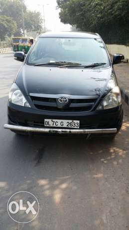 Toyota Innova diesel  Kms  black 7 seater