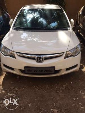 Honda Civic 1.8sat  kms done,white