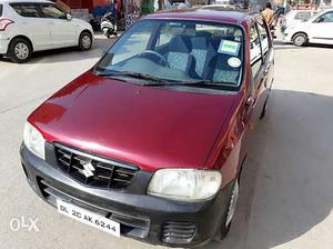  Alto Lxi CNG on RC 1st owner  kms run Wine red