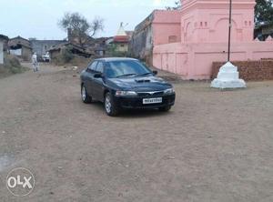  Mitsubishi Lancer petrol  Kms