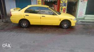  Mitsubishi Lancer petrol  Kms