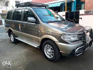 ,tavera NEO LT-L 9 SEATER BS III,single owner,grey colour