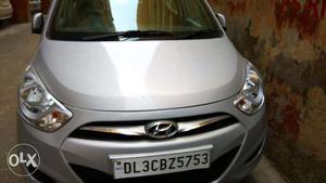 Company"s Well Maintained I10 Megna Silver Colour Car For