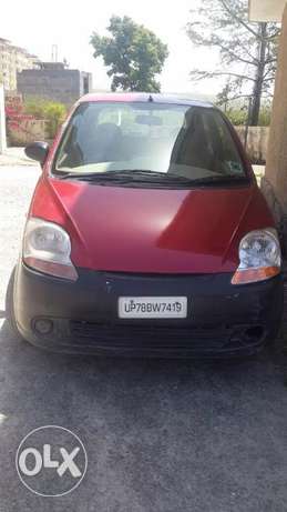 Red color Chevrolet Spark kanpur registration with NOC to