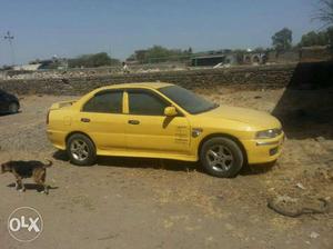  Mitsubishi Lancer petrol  Kms