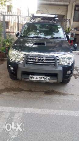 Black toyota fortuner  model in excellent condition.