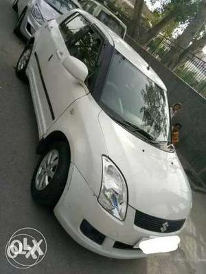 Swift zxi top model cng on papers 2 nd owner  km