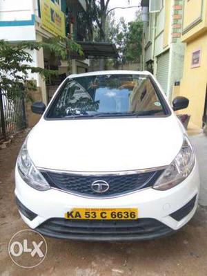 Tata Zest white color Car with Yellow Board registration