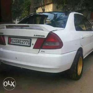  Mitsubishi Lancer petrol  Kms