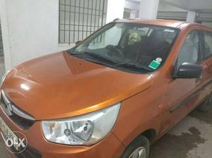 Maruti Suzuki Alto K10 vxi AMT tangy orange petrol  Kms
