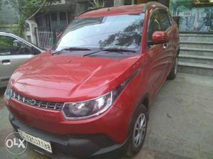 Mahindra kuv 100 k6 + six seater petrol  Km run lava red