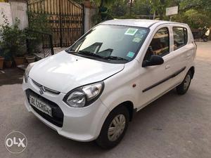 Maruti suzuki alto lxi green  driven