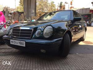  Mercedes-Benz E Class petrol  Kms