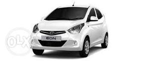 Hyundai White Eon Era Plus  Model slight dent insurred