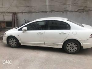  model White coloured Civic available for Sale in Delhi