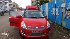 Fire Red Swift 23k km,  model. Well maintained and high