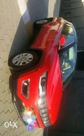 Jeep compass limited, exotic Red with black top.