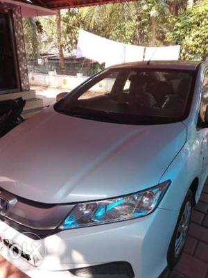 Well Maintained Honda City Orchid Pearl White -KM only