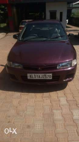  Mitsubishi Lancer petrol  Kms