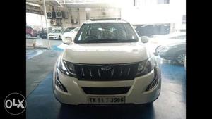 The firt owner of mahindra XUV500 W10 AT 1.99 white coulor