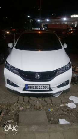Honda City  Automatic petrol  Kms With Sunroof
