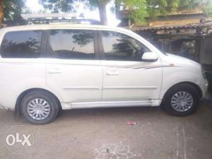 White color Mahindra XYLO Car with New branded tyres for