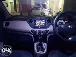 Grand i10 sportz AUTOMATIC  kms 1 lakh rs + extra