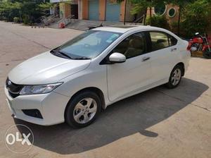 Pearl White Honda City i-DTEC VX with electric sunroof