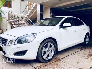 White Volvo S60 D4 (Summum) with sunroof in