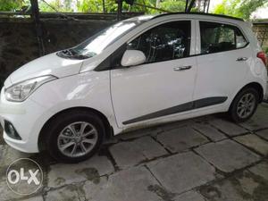 Hyundai Grand i10 (Asta) white color top end MT with airbag