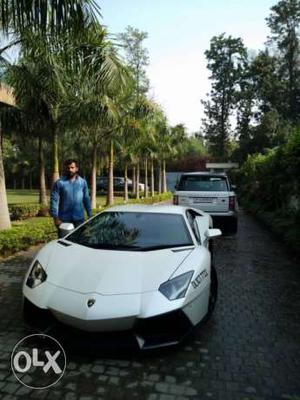 Both cars leamborgini and range rover 1 lakh can