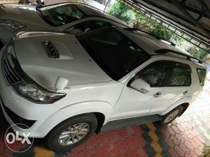 Toyota Fortuner  (Pearl White)
