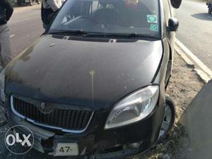 Accidented Skoda Fabia Car  model for sale.