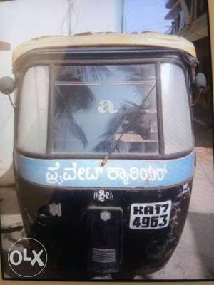 Bajaj front engine auto, private carrier, running