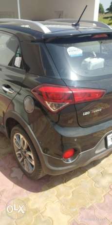 Hyundai i20 active in black color with diesel  Kms