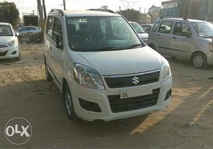 First Owner, Green CNG WagonR Lxi  DL number