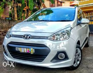 Low km driven Well maintained grand i10 sportz showroom
