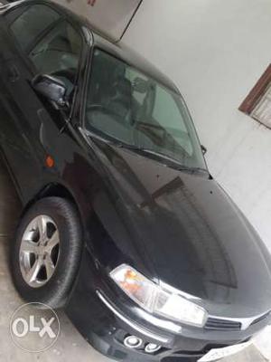  Mitsubishi Lancer petrol  Kms