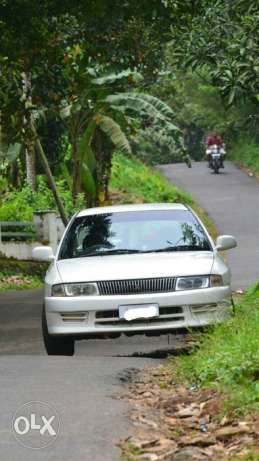  Mitsubishi Lancer petrol  Kms