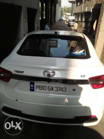 Tata tigor xz top model petrol  Kms  year