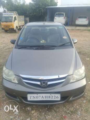  Honda City Zx petrol  Kms, two owners.