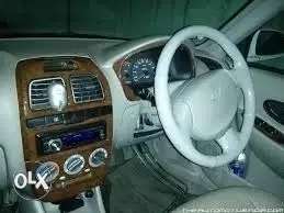 Hyundai Accent with CNG wooden dashboard . Reason to buy