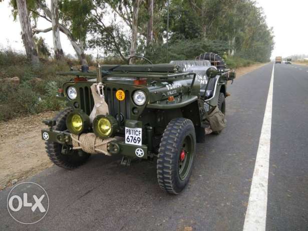 Open modify jeep in military color. Any