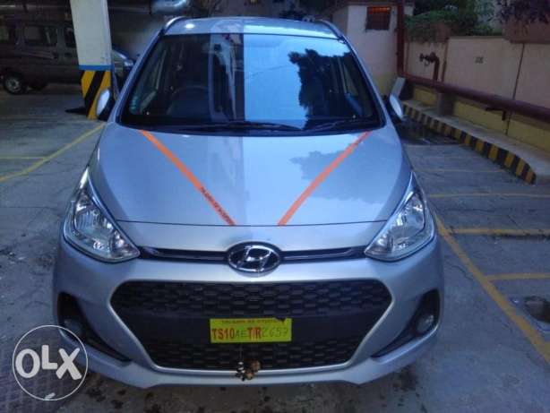 Jan 18 Grand i10 with showroom condition