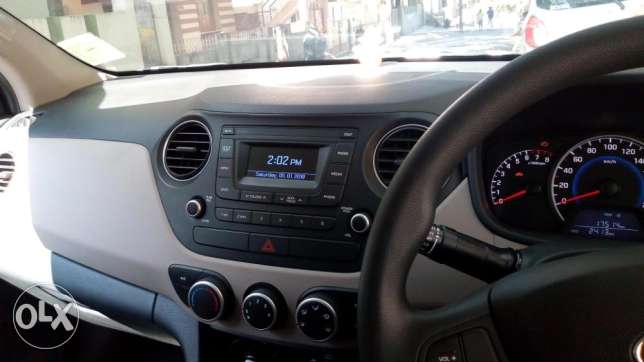 Brand new Grand i10 in excellent condition,  kms only