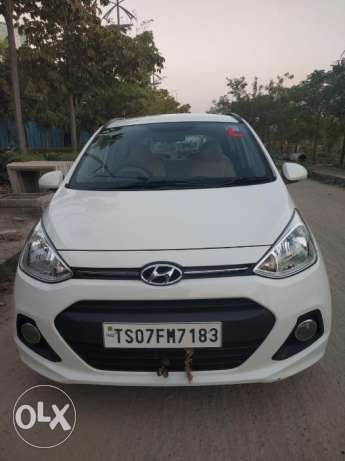 Grand i10 sportz Petrol KM