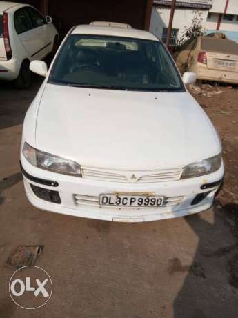  Mitsubishi Lancer petrol  Kms