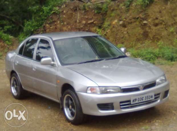  Mitsubishi Lancer petrol  Kms